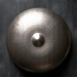 Stainless steel handpan in D-minor scale, showing its textured surface and tone fields.